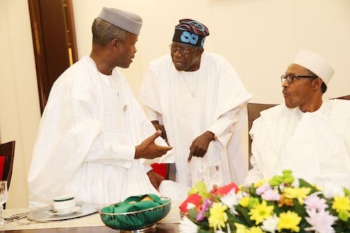 FILE PHOTO: President Muhammadu Buhari looks on as Bola Tinubu and Vice President, Yemi Osinbajo chat during the Presidential Dinner in honor of Senators at the State House in Abuja