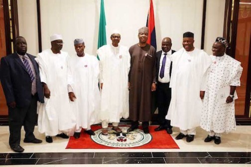 President Muhammadu Buhari flanked by the Vice President Yemi Osinbajo and Senate President, Senator Bukola Saraki and other principal officers of the Senate during Presidential Dinner in honor of Senators at the State House in Abuja