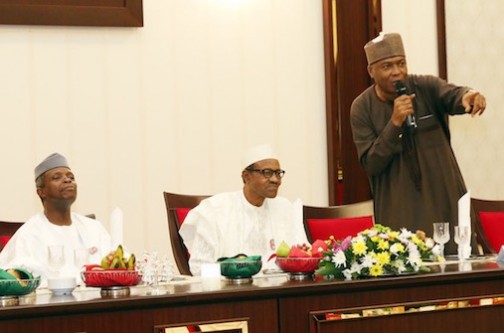 Senate President, Bukola Saraki points out something to Buhari and Osinbajo
