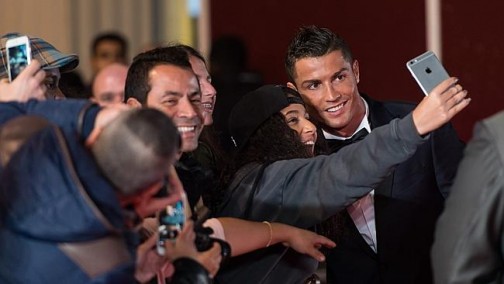 Cristiano Ronaldo takes selfies with a fans at the world premiere of 'Ronaldo'. Source: Getty Images
