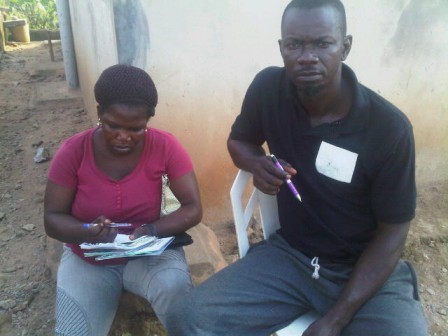 Segun and his wife at the premises of the bank with other victims waiting helplessly