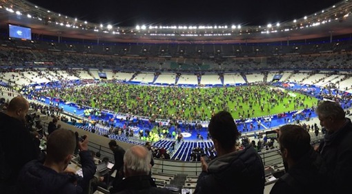 Football fans rushed onto the Stade de France pitch after terror attack in Paris