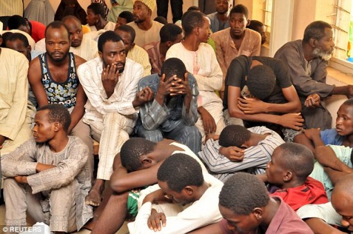 Terrified civilians wait for news about family and friends caught up in the horrific Kano attacks