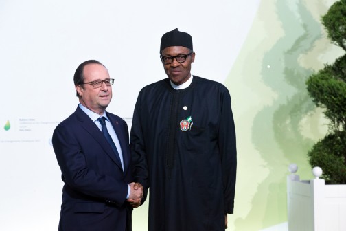 UN CLIMATE CHANGE SUMMIT: President Muhammadu Buhari in a handshake with the French President François Hollande at the Opening of UN Climate Change Conference in Paris, France. Nov. 30 2015