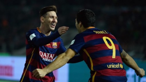 Messi and Suarez celebrate goals