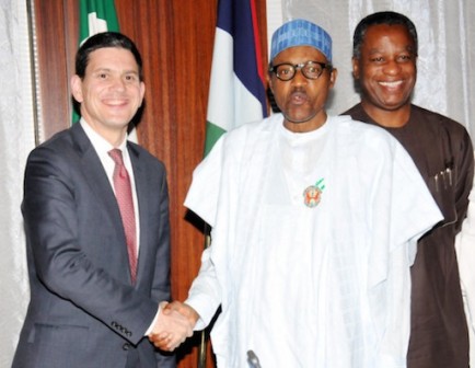 Buhari with David Milliband, president of International Rescue Committee with Foreign Minister, Geoffrey Onyema beaming behind