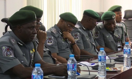 A cross section of senior Customs officer at the meeting