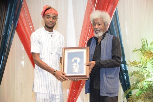 Journalist of the Year, Wole Soyinka Centre for Investigative Journalism (WSCIJ), Emmanuel Ogala (left), receives his award from Prof. Wole Soyinka, during the 10th award ceremony of WSCIJ at MUSON Centre in Lagos on Wednesday Photo: Idowu Ogunleye