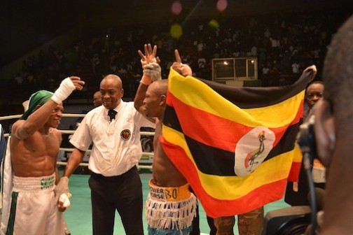 New African featherweight King, Uganda's Edward Shaka Kakembo exchanges pleasantries after pummeling Nigeria's 'Skoro'