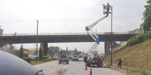 Engineers from the Lagos State Government working on street lights in Oworoshoki, Lagos, as part of government’s effort to light up major areas of the state, on Monday, November 30, 2015.