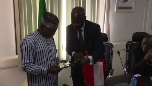 Customs boss, Hameed Ali receives a gift for EFCC boss, Ibrahim Magu