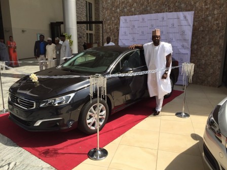 Afolayan with the new Peugeot 508 model