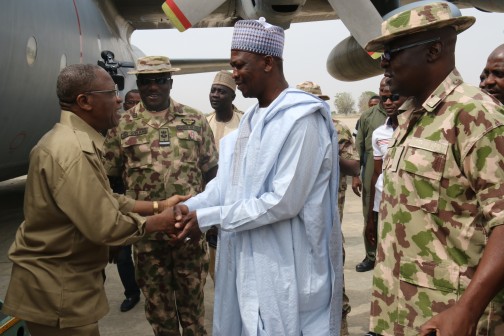  Minister of Information and Culture Alhaji Lai Mohammed being received by the Deputy Governor of Borno State, Alhaji Usman Durkwa and the Theatre Commander, Operation Lafiya Dole, Maj. Gen.  Y. M. Abubakar upon his arrival at the Air Force Base Maiduguri to visit  some towns liberated by the military from Boko Haram