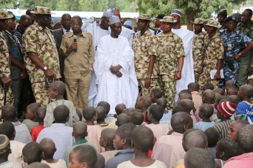 Minister of Information and Culture Alhaji Lai Mohammed addressing children at the Internally Displaced Persons Camp in Bama during his visit to  some towns liberated by the military from Boko Haram in Borno State. 