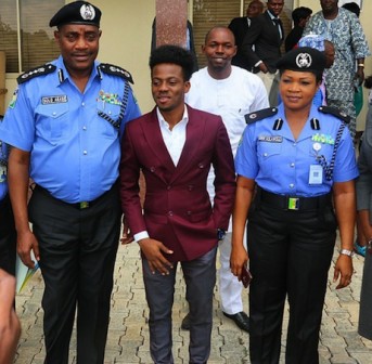 L-R: Inspector General of Police, Solomon Arase, Korede Bello and Force acting PRO, Olabisi Kolawole
