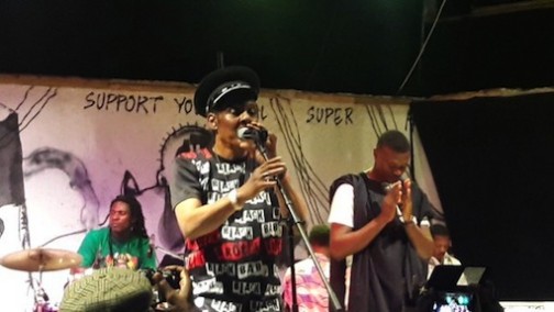 Majek Fashek performing on stage