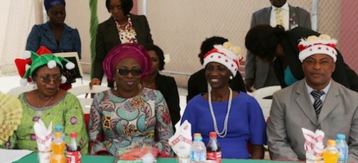 Wife of Lagos State Governor, Mrs. Bolanle Ambode (right) cutting the tape to declare open the LASPARK 2015 Christmas Family Fun Share celebration at the Ndubuisi Kanu Park, Alausa, Ikeja, on Tuesday, December 15, 2015. With her is the Managing Director, Lagos State Parks & Gardens Agency (LASPARK), Dr. (Mrs.) Titilayo Anibaba (left).