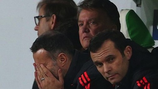Louis van Gaal and the rest of the coaching crew show their frustration after Manchester United crashed out of the UEFA Champions League