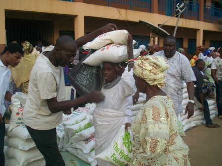 Widows and the aged carrying their rice donated by Hydra Edge Foundation, Agege, Lagos.