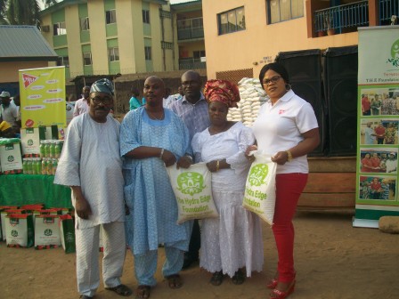 Mrs Opeifa (right) with beneficiaries of the rice distribution in Agege at Christmas