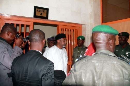 Former NSA Sambo Dasuki with Salisu Shuaib, former Director of Finance and Admin [in blue] and Aminu Baba, former NNPC Director on arrival at the High Court of Federal Capital Territory, Abuja on Monday morning, 14 Dec. 2015. Photos: Femi Ipaye
