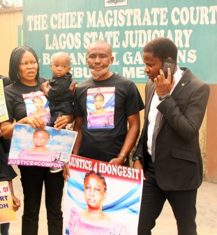 L-R: President Women Arise, Dr. Joe Okei-Odumakin with Elijah Udoh; widower Mr. Godwin Udoh & Barr. Christian Love  at the hearing on the alleged murder of Mrs Idongesit Udoh by Police officer, Museliu Aremu, at the Magistrates' Court, Ebute Metta on Wednesday, 27 Jan., 2016