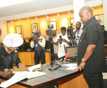 Rivers State Governor, Nyesom Ezenwo Wike swearing in the State Chief Judge, Justice Daisy Wotube Okocha at the Executive Council Chamber of Government House, Port Harcourt on Monday.