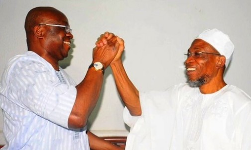 Fayose shake hands with Aregbesola as both governors look at each other in admiration