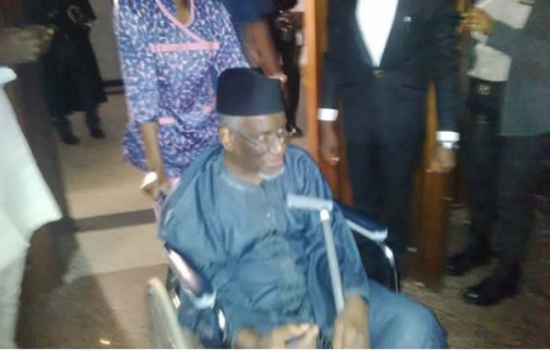 Haliru Bello Mohammed arriving the court premises on wheelchair