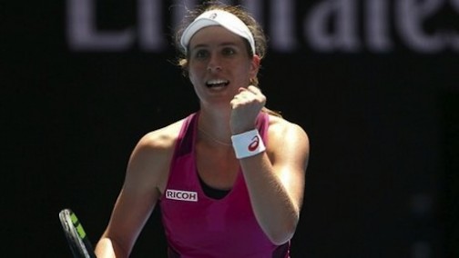 Johanna Konta pumps her fist after beating Venus Williams