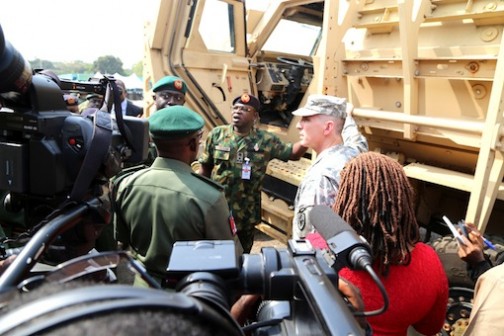 Maj. Gen. BT Ndiomu, representing Minister of Defence with others inspecting one of the vehicles Photo: Idowu Ogunleye