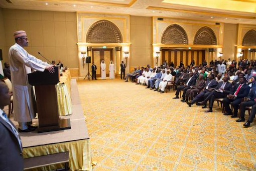 President Muhammadu Buhari addressing the Nigerian community
