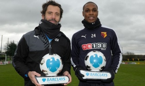 Quique Sanchez Flores and Odion Ighalo pose with their awards