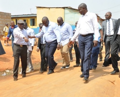 Lagos State Governor, Mr. Akinwunmi Ambode (middle), with Commissioner for Energy & Mineral Resources, Mr. Wale Oluwo (right) and  Permanent Secretary, Ministry of Works & Infrastructure, Engr. Bade Adebowale (left), during the Governor’s Inspection Tour of Church Road, Agbelekale and Giwa Street, Aboru in Agbado Oke-Odo LCDA, on Thursday, January 21, 2016