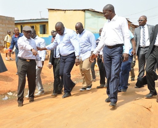 Lagos State Governor, Mr. Akinwunmi Ambode (middle), with Commissioner for Energy & Mineral Resources, Mr. Wale Oluwo (right) and  Permanent Secretary, Ministry of Works & Infrastructure, Engr. Bade Adebowale (left), during the Governor’s Inspection Tour of Church Road, Agbelekale and Giwa Street, Aboru in Agbado Oke-Odo LCDA, on Thursday, January 21, 2016.