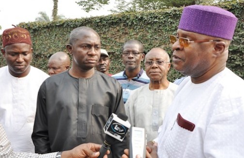 Chairman, Resident Association of PalmGroove Estate, Capt. Jide George (right), fielding questions from news men while Lagos State Commissioner for Energy & Mineral Resources, Mr. Wale Oluwo (2nd left) and Executive Secretary, Odi Olowo-Ojuwoye Local Council Development Area, Hon. Razaq Ajala (left), watch, during the handing over of a 500KVA Transformer to PalmGroove Estate in Odi Olowo-Ojuwoye LCDA by the Lagos State Government, on Saturday, January 30, 2016
