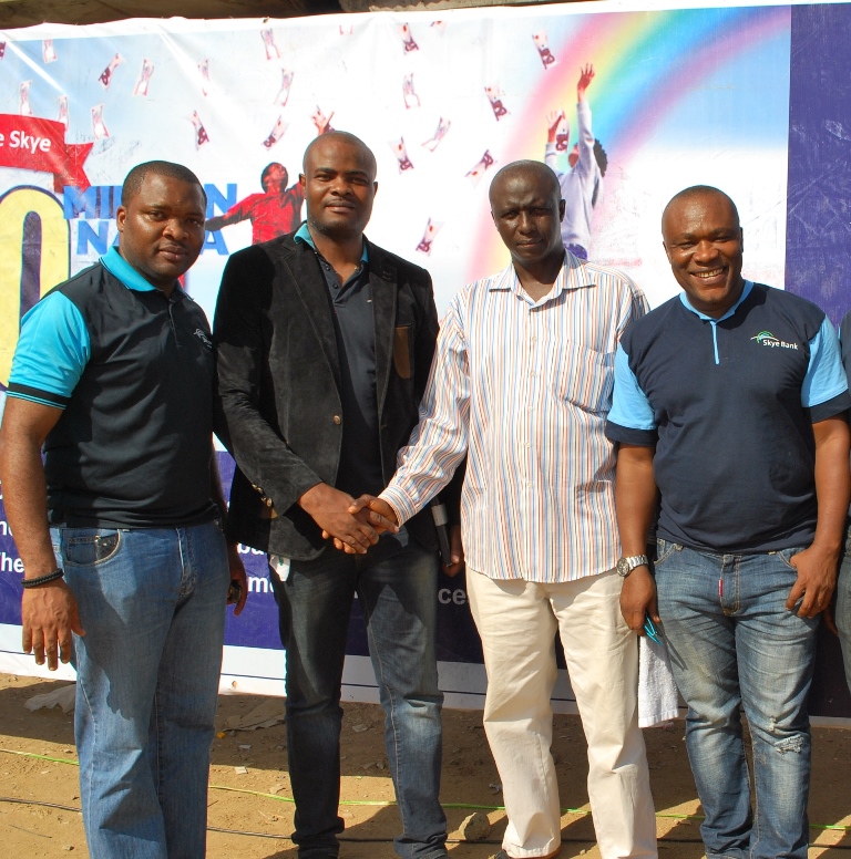 L-R: Business Development Manager, Eziukwu Road Branch , Aba, Chinedu Oguejiofor, Head, Retail Banking ,Nkolika Okoli, Regional Director , South East 2, Chukwudi Onuegbu, Winner, N250,000 at Ariaria Market today, A businessman, Chinonso Ezeanya and Assistant Manager, National Lottery Regulatory Commission, Opara Celestine at the  Bank’s “Reach For The Skye”  reward draw held in Ariaria International  Market, Aba in Abia State today, 21st January , 2016