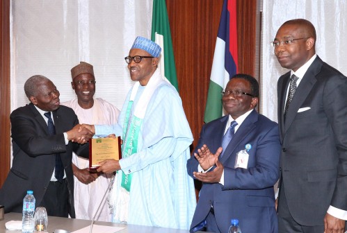  R-L; Former MD of Access Bank Plc, Mr. Aigboje Aig-Imoukhuede, Minister of Health, Mr Isaac Adewole, President Muhammadu Buhari being presented with  a plaque by the former Nigerian High Commissioner to United Kingdom, Dr Christopher Kolade supported by Alhaji Muhammad Abubakar and Mrs Omotayo Omotosho during an audience with the President at the State House in Abuja. PHOTO; SUNDAY AGHAEZE. JAN 21 2016.