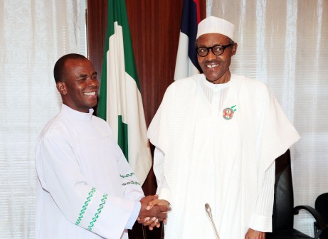 R-L; President Muhammadu Buhari and Rev Father Mbaka during an audience with President Buhari at the State House. DEC 18 2015.