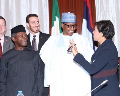 The United States Secretary of Commerce, Penny Pritzker, President Muhammadu Buhari, member of the delegation Mr Kyle Murphy and Vice President Prof Yemi Osinbajo during an audience with the visiting US Secretary of Commerce at the State House in Abuja. PHOTO; SUNDAY AGHAEZE. JAN 26 2016.