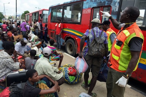 Togolese refugees board buses provided by Lagos State Environmental protection in Lagos, on August 14, 2015 ©Pius Utomi Ekpei (AFP)