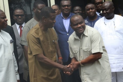 L-R: Pastor E.A. Adeboye shake hands with Governor Nyesom Wike
