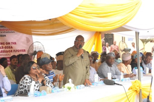 Commissioner for Works and Infrstructure, Engr. Ganiu Johnson (standing) addressing the stakeholders at a meeting on the Abule-Egba Flyover construction