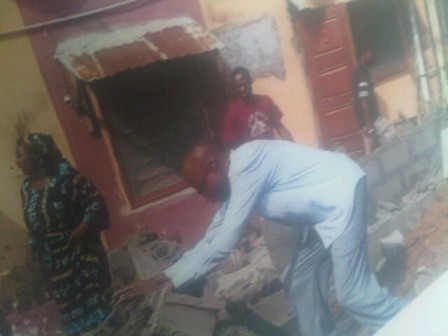 Barrister Olu Johnson demolishing a buiding at Jakande Estate, Ejigbo