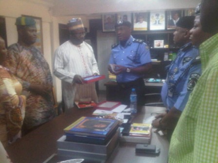 CP Owoseni presenting a sourvenir to NDE Director, Yemi Okunola at the CP's office on Wednesday, 10 Feb. 2016