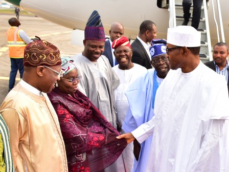   President Muhammed Buhari in a warm handshake with the deputy governor of lagos state, Dr Idiat Oluranti Adebule, on arrival at the presidential wing of the Muritala Muhammed International Airport on his way to Ogun State for a 2 day working visit on Monday, 1st February, 2016.. With them are from left; Minister of Information and Culture, Alh. Lai Muhammed, Ogun State Governor, Senator Ibikunle Amosun, Chief Bisi Akande and APC national leader, Asiwaju Bola Ahmed Tinubu.   