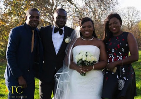 Funke and JJC flank Tunde and Abi Babalola during the couple's wedding in London