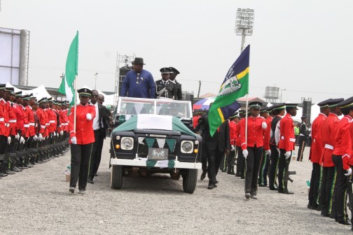 Governor of Bayelsa State, Hon. Seriake Dickson inspecting a Guard of Hnour mounted by a detachment of the Nigerian Police, Bayelsa State Command, shortly after being sworn in as Governor of the State for a 2nd term  at the Samson Siasia Sports Complex in Yenagoa, on Sunday, 14 Feb, 016.  Photo by Lucky Francis
