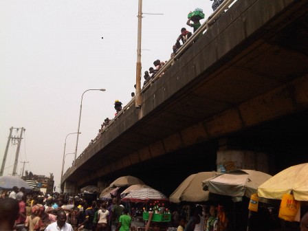 Crowd at the scene where Waidi was crushed to death in Lagos on Saturday, 13 Feb 2016.