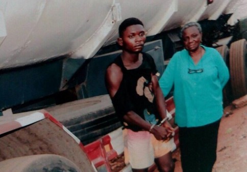 Omoruyi Nathaniel arrested with the receiver, one Mrs Adeyemi Adeyoyiosola